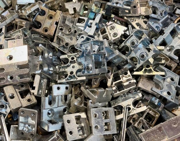 Zinc,Die,Cast,Window,Components,Waste,From,A,Manufacturing,Process